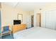 Bright bedroom featuring a flat-screen TV and a closet at 1304 N Ocean Blvd. # S-307, Myrtle Beach, SC 29577