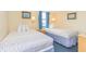Bedroom with two beds, providing ample sleeping space at 1304 N Ocean Blvd. # S-307, Myrtle Beach, SC 29577