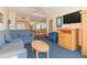 Comfortable living room featuring a tv, dining area, and ocean views at 1304 N Ocean Blvd. # S-307, Myrtle Beach, SC 29577