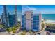 Exterior view of the Yachtsman condo complex featuring a private pier and beach at 1304 N Ocean Blvd. # S-501, Myrtle Beach, SC 29577