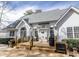 Backyard view with large deck, seating and grill at 1427 Mcmaster Dr., Myrtle Beach, SC 29575
