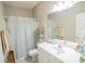 Clean bathroom with single sink vanity and combination shower and tub at 1427 Mcmaster Dr., Myrtle Beach, SC 29575