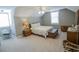 Spacious bedroom with sloped ceiling, carpet flooring and coordinated vintage decor at 1427 Mcmaster Dr., Myrtle Beach, SC 29575