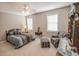 Bright bedroom with neutral walls, carpeted floors, and well-coordinated decor and furniture at 1427 Mcmaster Dr., Myrtle Beach, SC 29575