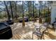 Multi-level wooden deck with outdoor furniture and landscaping surrounding the property at 1427 Mcmaster Dr., Myrtle Beach, SC 29575