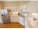 Well-lit kitchen with white cabinets, stainless steel appliances, and ample counter space at 1427 Mcmaster Dr., Myrtle Beach, SC 29575