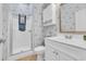 Charming bathroom with nautical themed wallpaper, white vanity, and a walk-in shower at 154 Harbor Oaks Dr., Myrtle Beach, SC 29588