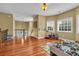 Large bonus room with hardwood floors and natural light, perfect for recreation at 154 Harbor Oaks Dr., Myrtle Beach, SC 29588