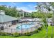 A community pool with a nearby river and a picturesque bridge in the background at 154 Harbor Oaks Dr., Myrtle Beach, SC 29588