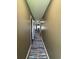 Hallway with beautiful wood flooring and blue runner at 1851 Colony Dr. # 5M, Surfside Beach, SC 29575