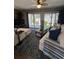 Spacious living room with sliding glass doors to backyard at 1851 Colony Dr. # 5M, Surfside Beach, SC 29575