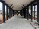 View under raised house with gravel and beams providing support at 189 Brown Pelican Loop, Pawleys Island, SC 29585