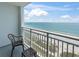 Relaxing balcony seating area overlooking a beautiful ocean and sandy beach view at 2000 N Ocean Blvd. # 1206, Myrtle Beach, SC 29577