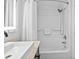 Clean bathroom featuring a square sink, shower with curtain, and modern shower head at 2000 N Ocean Blvd. # 1206, Myrtle Beach, SC 29577