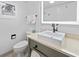Well-lit bathroom featuring a modern sink, stylish fixtures, and a neutral color scheme at 2000 N Ocean Blvd. # 1206, Myrtle Beach, SC 29577