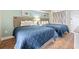 Bright bedroom featuring two beds with blue comforters and soft pillows at 2000 N Ocean Blvd. # 1206, Myrtle Beach, SC 29577