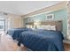 Comfortable bedroom with two beds and beach themed wall art at 2000 N Ocean Blvd. # 1206, Myrtle Beach, SC 29577