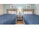Bright bedroom featuring two beds and nightstand at 2000 N Ocean Blvd. # 1206, Myrtle Beach, SC 29577