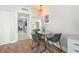 Comfortable living area features a dining table, closet and a peek into the kitchen at 2000 N Ocean Blvd. # 1206, Myrtle Beach, SC 29577
