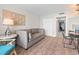 View of a cozy living room with couch, table, and sliding doors to a balcony at 2000 N Ocean Blvd. # 1206, Myrtle Beach, SC 29577