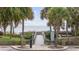 Scenic beach access framed by palm trees, leading to the beach and ocean at 2001 S Ocean Blvd. # 920, Myrtle Beach, SC 29577