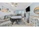 Cozy living room with sleeper sofa, beach-themed decor, and access to a balcony with a beautiful ocean view at 2001 S Ocean Blvd. # 920, Myrtle Beach, SC 29577