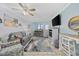 Cozy living room with comfortable seating, decor, and access to balcony at 2001 S Ocean Blvd. # 920, Myrtle Beach, SC 29577