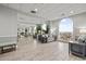 Bright lobby area with comfortable seating, stylish decor, and arched windows with an ocean view at 2001 S Ocean Blvd. # 920, Myrtle Beach, SC 29577