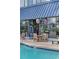 Outdoor pool deck featuring comfortable seating and views into the inviting restaurant at 2001 S Ocean Blvd. # 920, Myrtle Beach, SC 29577