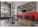 Inviting restaurant interior with modern decor, comfortable seating, and ample natural light from large windows at 2001 S Ocean Blvd. # 920, Myrtle Beach, SC 29577