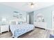 Inviting bedroom featuring beach-themed decor, soft lighting, and white furniture at 204 24Th Ave. N, North Myrtle Beach, SC 29582