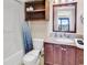 Bathroom with dark wood vanity, granite countertop, and shower-tub combination at 205 74Th Ave. N # 1607, Myrtle Beach, SC 29577