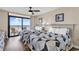 Bright bedroom with two queen beds and sliding glass doors to a balcony with ocean views at 205 74Th Ave. N # 1607, Myrtle Beach, SC 29577