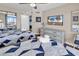This bedroom has two queen beds, mirrored closet doors, and a dresser with a TV at 205 74Th Ave. N # 1607, Myrtle Beach, SC 29577