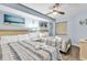 Comfortable bedroom featuring two beds, nautical decor, ceiling fan, and soft lighting for a relaxing ambiance at 205 74Th Ave. N # 1607, Myrtle Beach, SC 29577