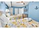 Spacious bedroom with two beds, nautical accents, ceiling fan, and ample space for a comfortable vacation at 205 74Th Ave. N # 1607, Myrtle Beach, SC 29577