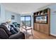 Inviting living room featuring ocean views, a plush leather couch, and a flatscreen television at 205 74Th Ave. N # 1607, Myrtle Beach, SC 29577