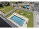 Aerial view of the backyard showcasing the pool, fire pit, and well-maintained landscaping at 221 N Waccamaw Dr., Murrells Inlet, SC 29576