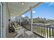 Nice balcony with a comfortable seating area and scenic views of the neighborhood at 221 N Waccamaw Dr., Murrells Inlet, SC 29576