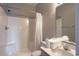 Well-maintained bathroom featuring shower, tub combination, and updated fixtures at 221 N Waccamaw Dr., Murrells Inlet, SC 29576