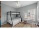 Bedroom with bunk bed, wood floors, and wicker night stand at 221 N Waccamaw Dr., Murrells Inlet, SC 29576
