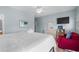 Cozy bedroom with soft lighting and view of the television; a relaxing space for rest and unwinding at 221 N Waccamaw Dr., Murrells Inlet, SC 29576