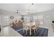 Spacious dining area with tile floors, ceiling fan, and plenty of natural light at 221 N Waccamaw Dr., Murrells Inlet, SC 29576