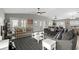 Spacious living room with vaulted ceilings and a view of the balcony at 221 N Waccamaw Dr., Murrells Inlet, SC 29576