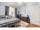 Relaxing bedroom featuring a wrought iron bed and wooden dresser, and natural light at 221 Rivers Edge Dr., Conway, SC 29526