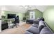 Bedroom featuring a vaulted ceiling, a cozy seating area, and a modern desk for work or study at 221 Rivers Edge Dr., Conway, SC 29526