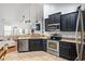 Well-equipped kitchen with granite countertops, stainless steel appliances, and a breakfast bar at 221 Rivers Edge Dr., Conway, SC 29526