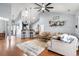 Spacious living room with hardwood floors, vaulted ceilings, and modern décor at 221 Rivers Edge Dr., Conway, SC 29526