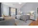 Comfortable main bedroom with a queen bed, neutral colors, and lots of natural light at 221 Rivers Edge Dr., Conway, SC 29526