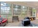 Bright sunroom with large windows and a tile floor at 221 Rivers Edge Dr., Conway, SC 29526